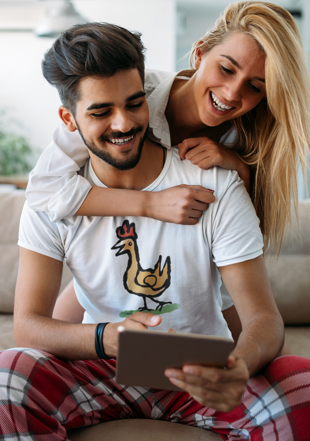 Happy Chicken T-shirt - Laughing young couple wearing Illustrated Funny Chicken design on white vegan cotton t-shirts by Hector and Bone