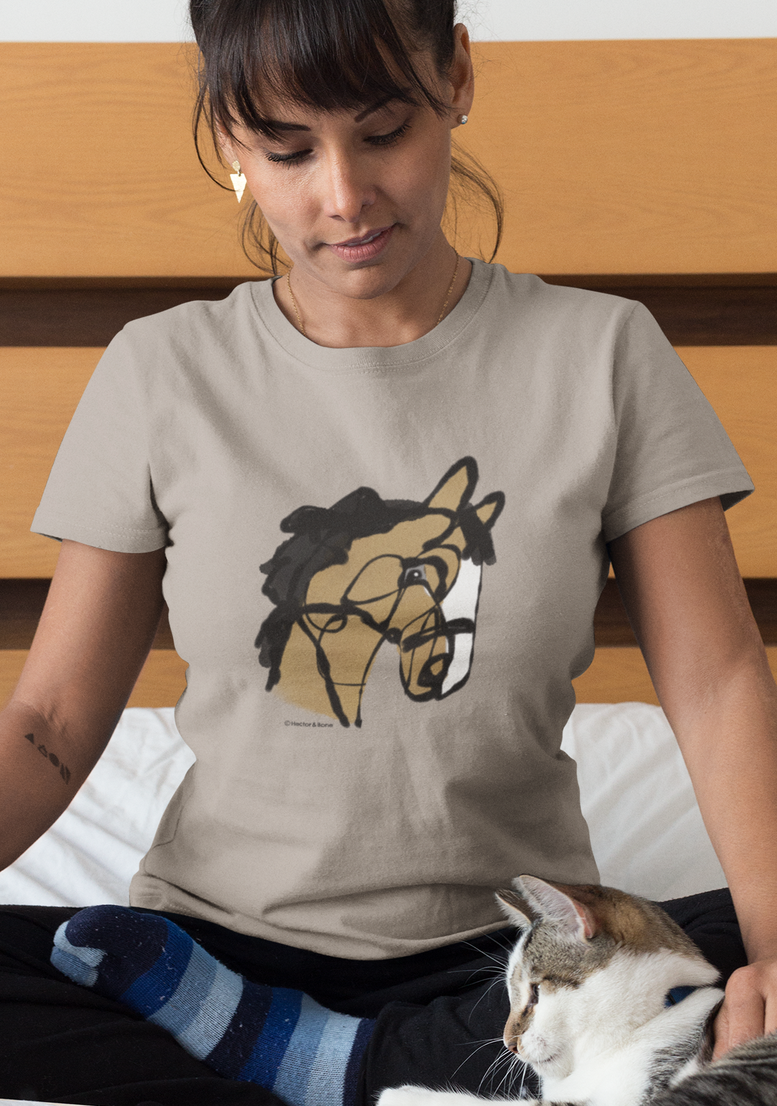 Horse T-shirt - Young woman wearing an illustrated horse lover original design printed on a desert dust colour vegan cotton pony t-shirt by Hector and Bone