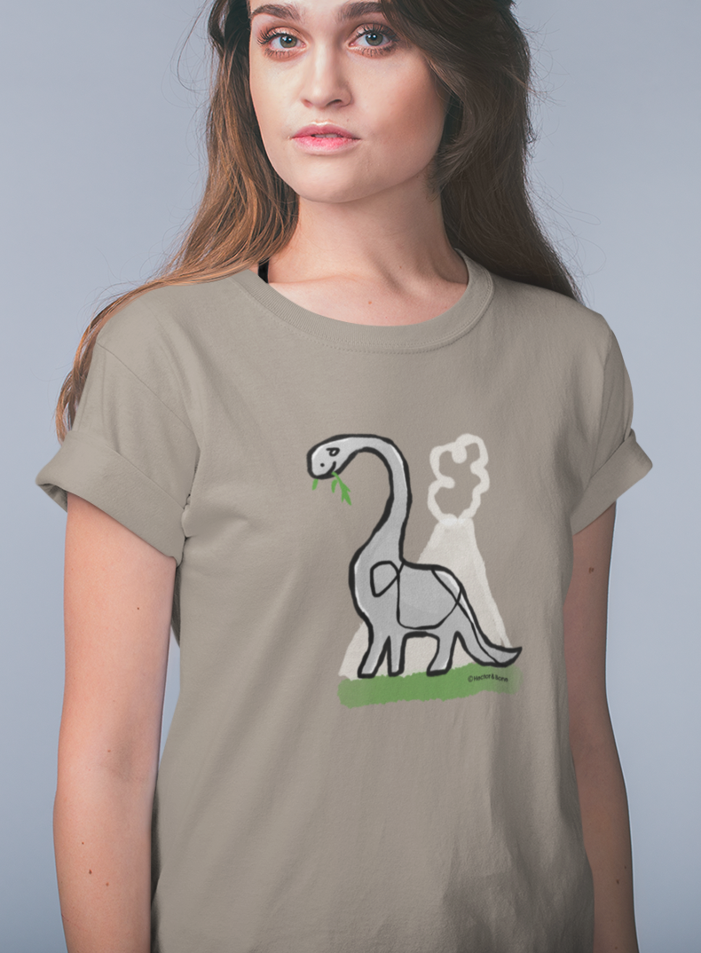 Young woman wearing a Dinosaur T-shirt illustrated on a Desert Dust colour Brontosaurus Tshirt design by Hector and Bone