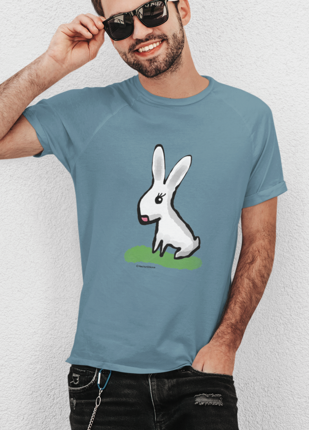 Cute Bunny T-shirt - Young man wearing original illustrated bunny design on blue colour vegan cotton t-shirts by Hector and Bone