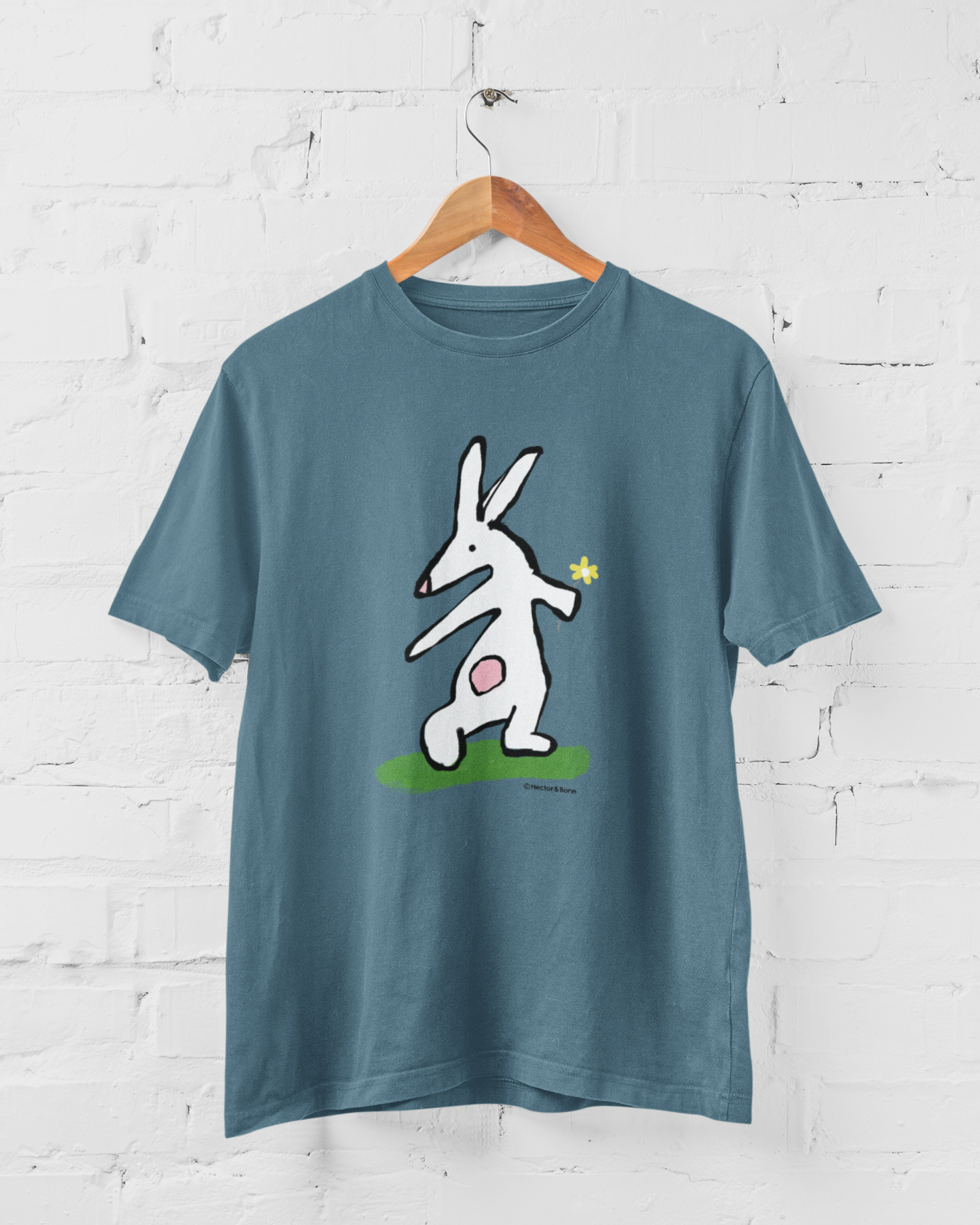 Bunny T-shirt - Illustrated rabbit holding a flower design on Stargazer blue vegan cotton - Easter Bunny t-shirts by Hector and Bone