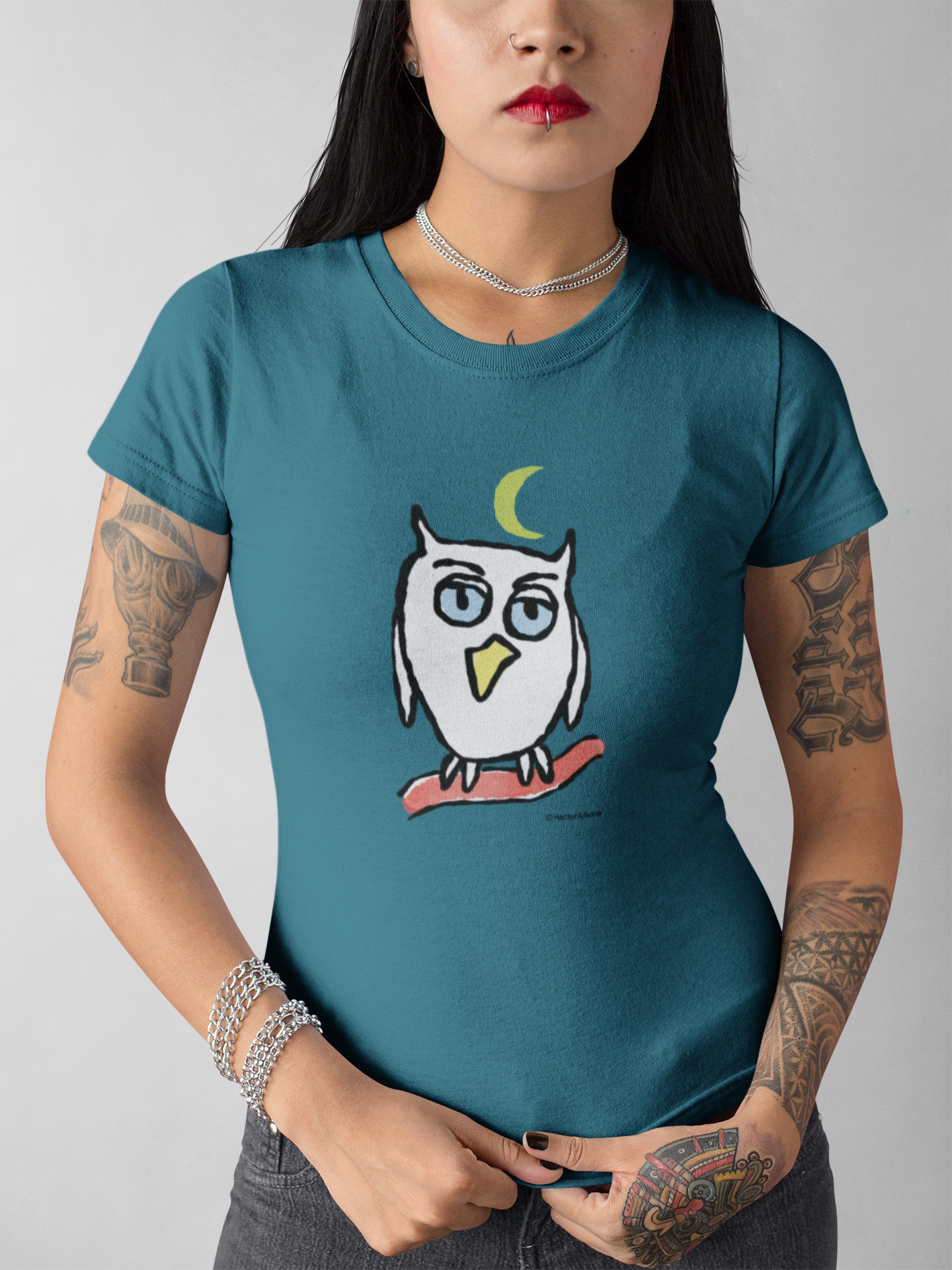 Owl T-shirts - Young woman wearing a stargazer blue colour vegan cotton Night Owl T-shirt design by Hector and Bone