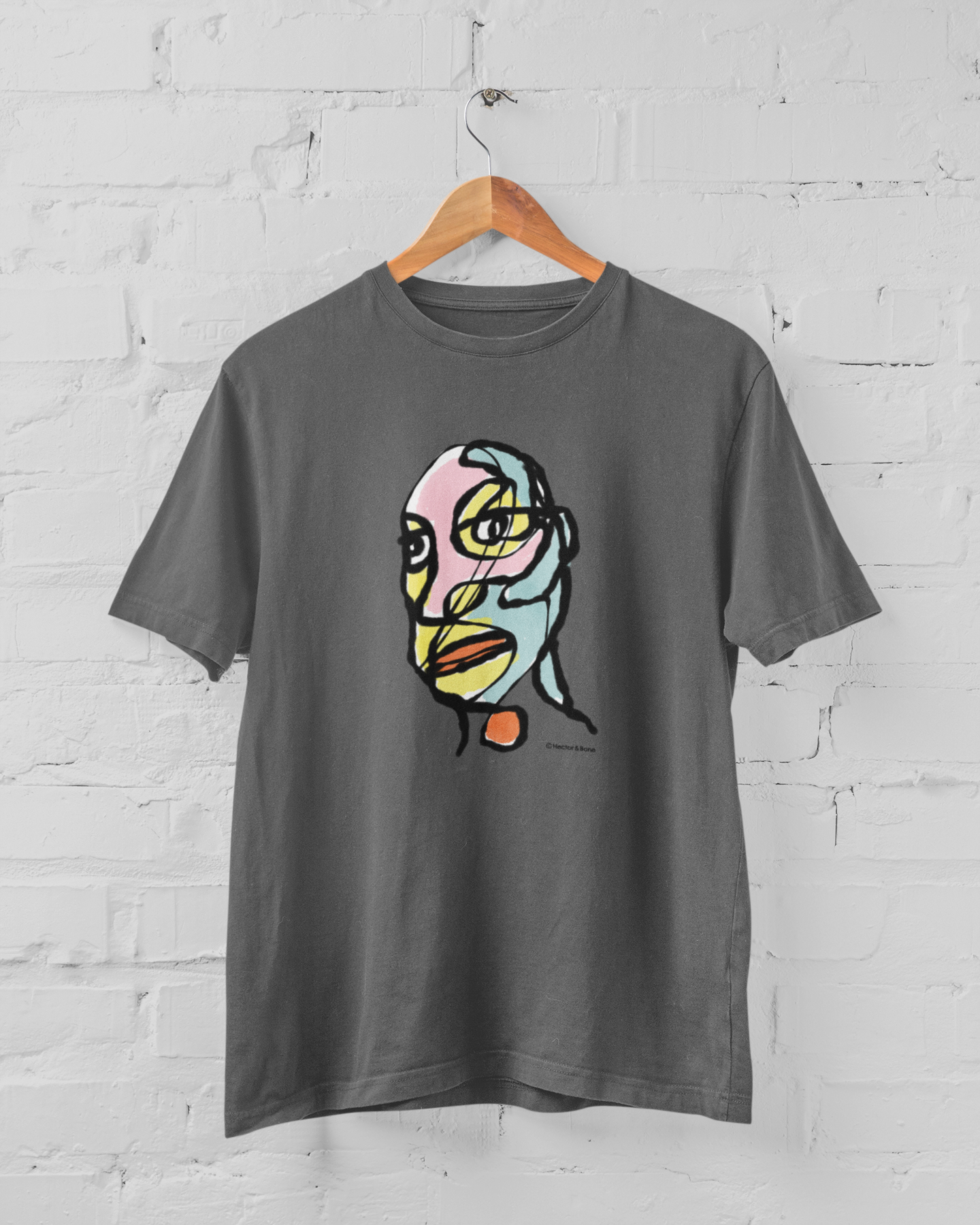 Abstract man portrait t-shirt - Edgy Eddie abstract man's face illustrated on a vegan dark grey cotton t-shirt by Hector and Bone