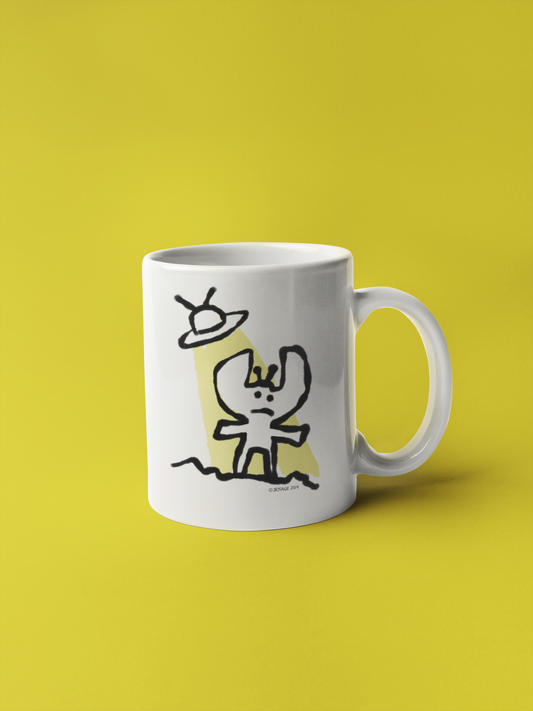 A White Ceramic Hector and Bone Mug with an illustration of a cute little Alien and his Spaceship