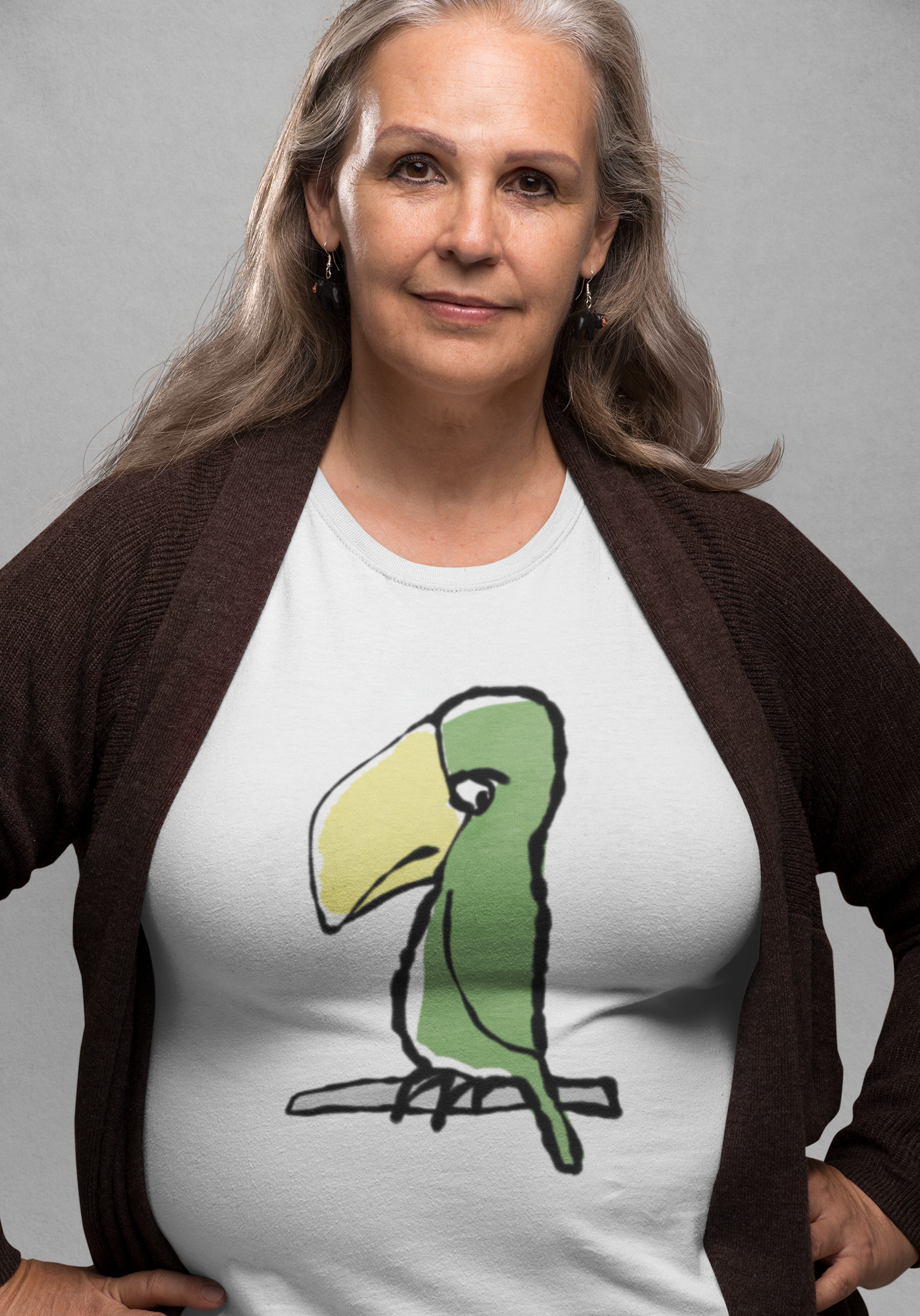 Woman wearing White Unisex Hector and Bone T-shirt printed with a cute illustration of Peter Parrot