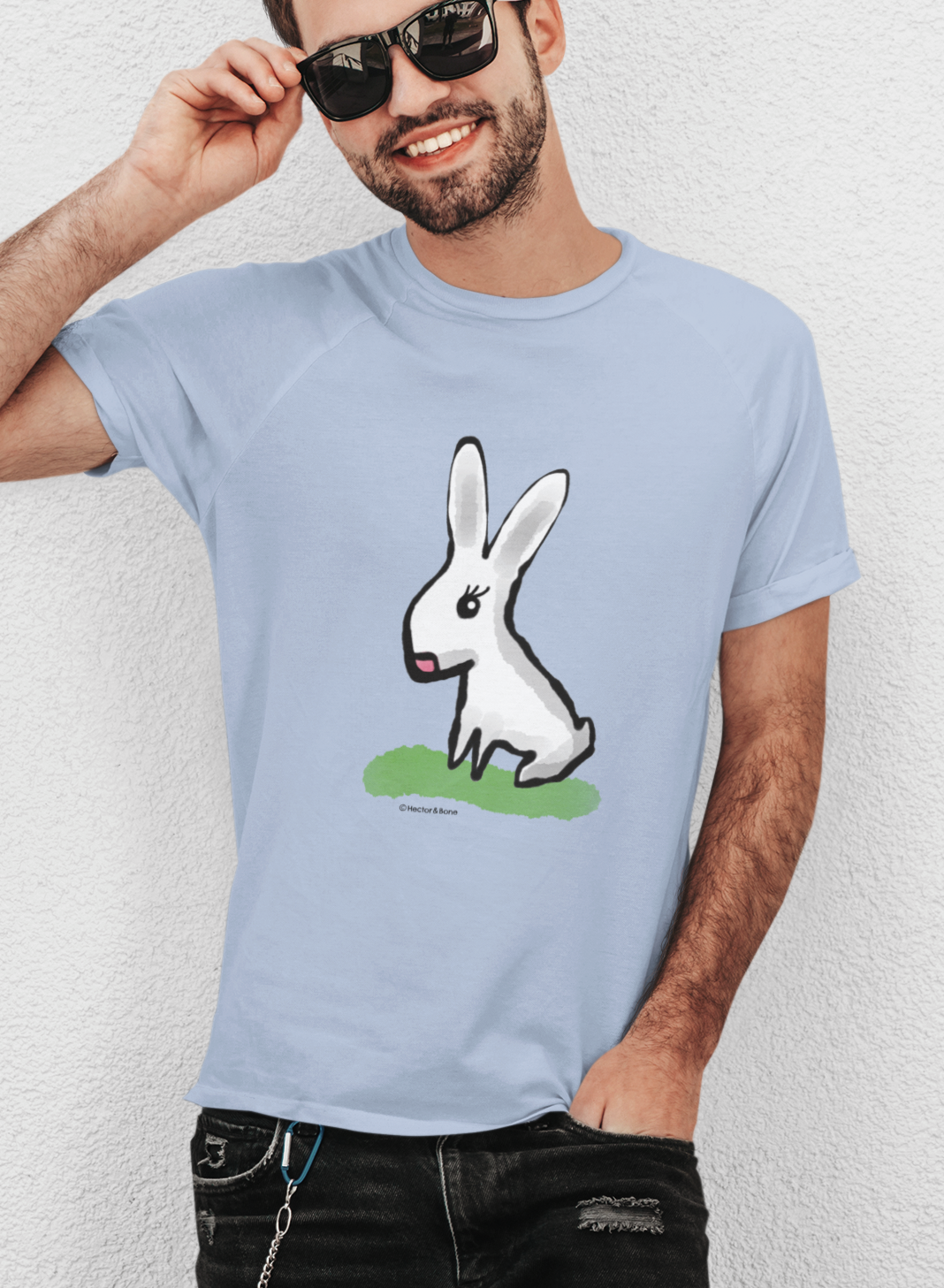 Cute Bunny T-shirt - Young man wearing original illustrated bunny design on sky blue colour vegan cotton t-shirts by Hector and Bone