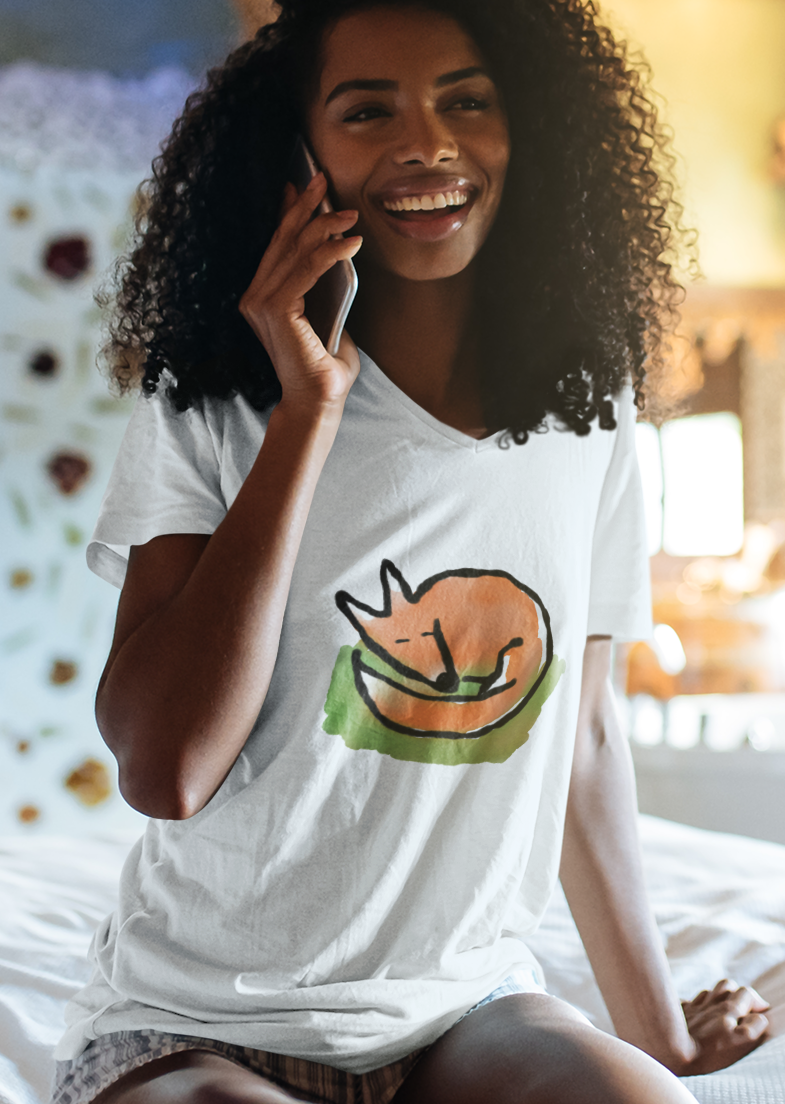 Young woman wears a cute Sleeping Fox illustrated cotton T-shirt. Original fox t-shirt design by Hector and Bone