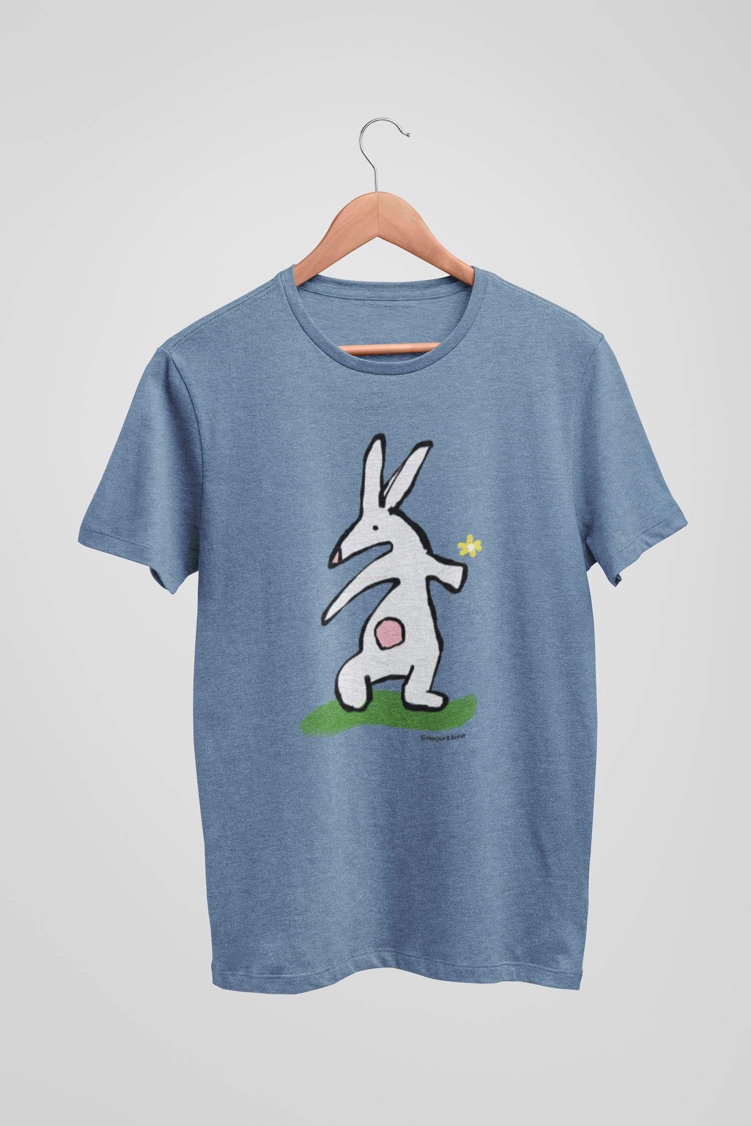 Bunny T-shirt - Illustrated rabbit holding a flower design on mid heather blue vegan cotton - Easter Bunny t-shirts by Hector and Bone