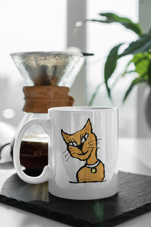 A White Ceramic Hector and Bone Mug with a cute Smiling Ginger Cat illustration on table