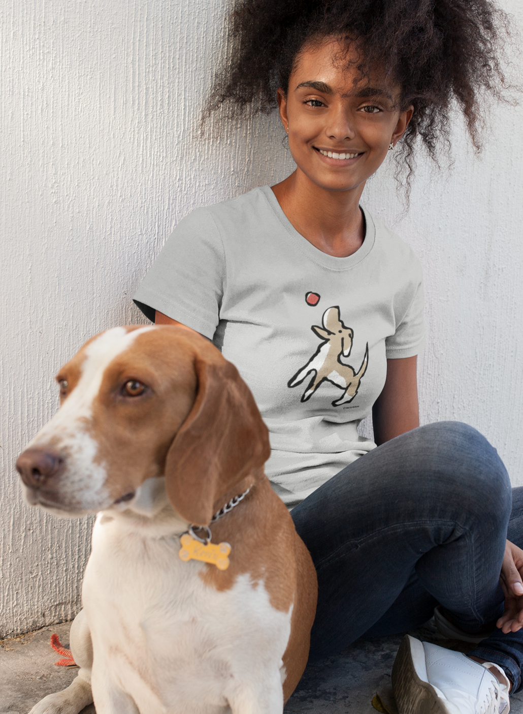 Dog T-shirt - Young woman with dog wearing an illustrated Jumping Dog T-shirt on heather grey vegan cotton by Hector and Bone