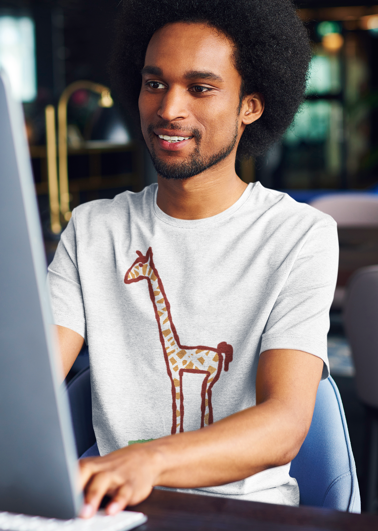 Young man wearing a Giraffe t-shirt - Illustrated Jeffrey Giraffe vegan cotton t-shirts by Hector and Bone