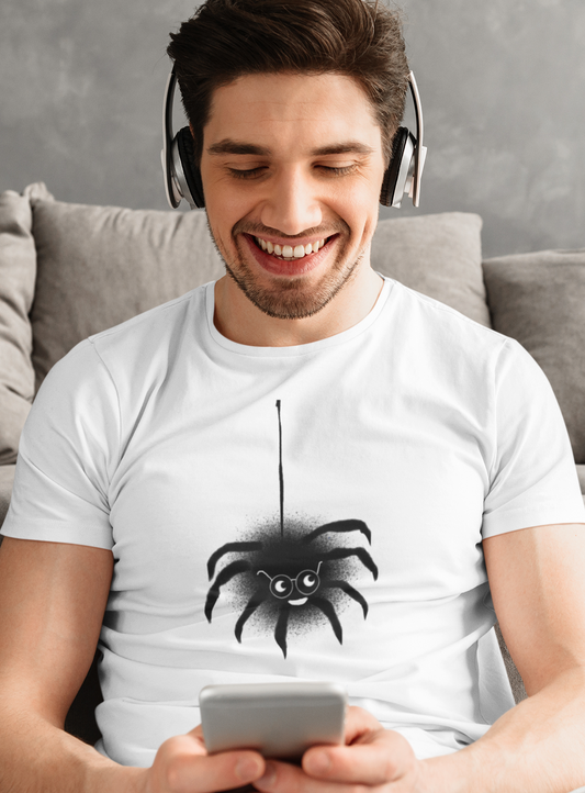 Spider T-shirt - A young man smiling wearing a cute Spencer Spider original illustrated Halloween design on a Hector and Bone quality vegan cotton t-shirt