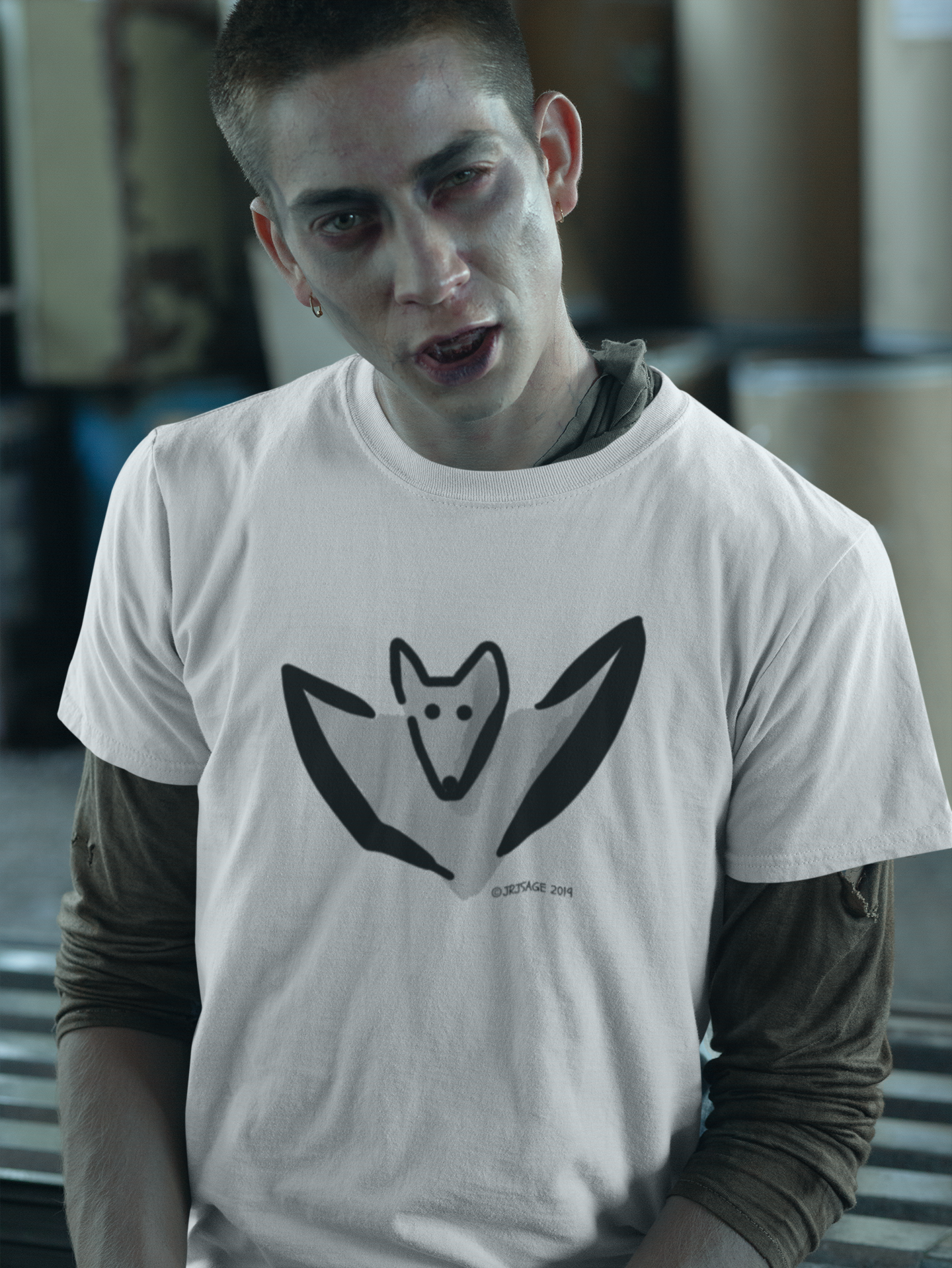 A man dressed as a zombie for Halloween wearing a cute Bertie Bat original illustrated design on a Hector and Bone quality vegan cotton bat t-shirt