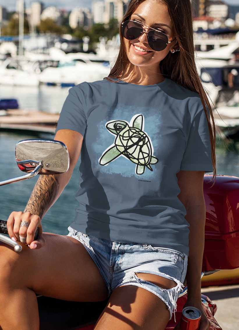 Sea Turtle T-shirt - Young woman wearing an illustrated green sea turtle t-shirt by Hector and Bone
