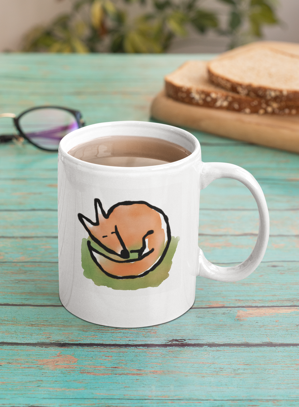 Sleeping Fox mug - Original illustrated Fox coffee mug by Hector and Bone on a table