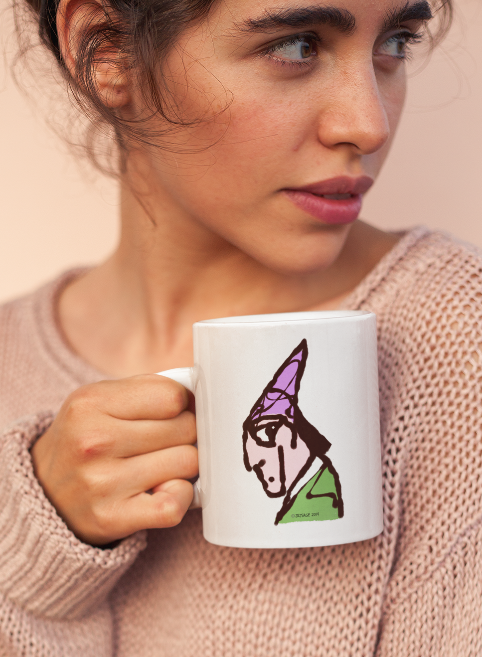 Young woman holding a ceramic white mug by Hector and Bone with cute Polar Bear illustration
