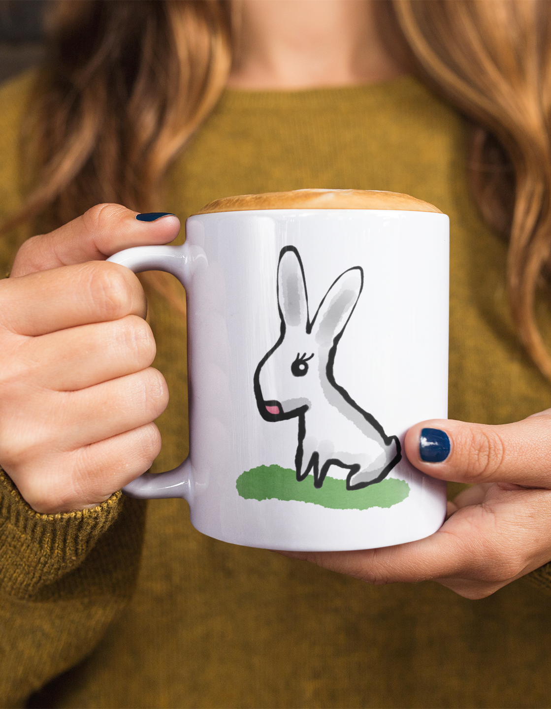 Cute Bunny coffee mug illustration by Hector and Bone help by a young woman