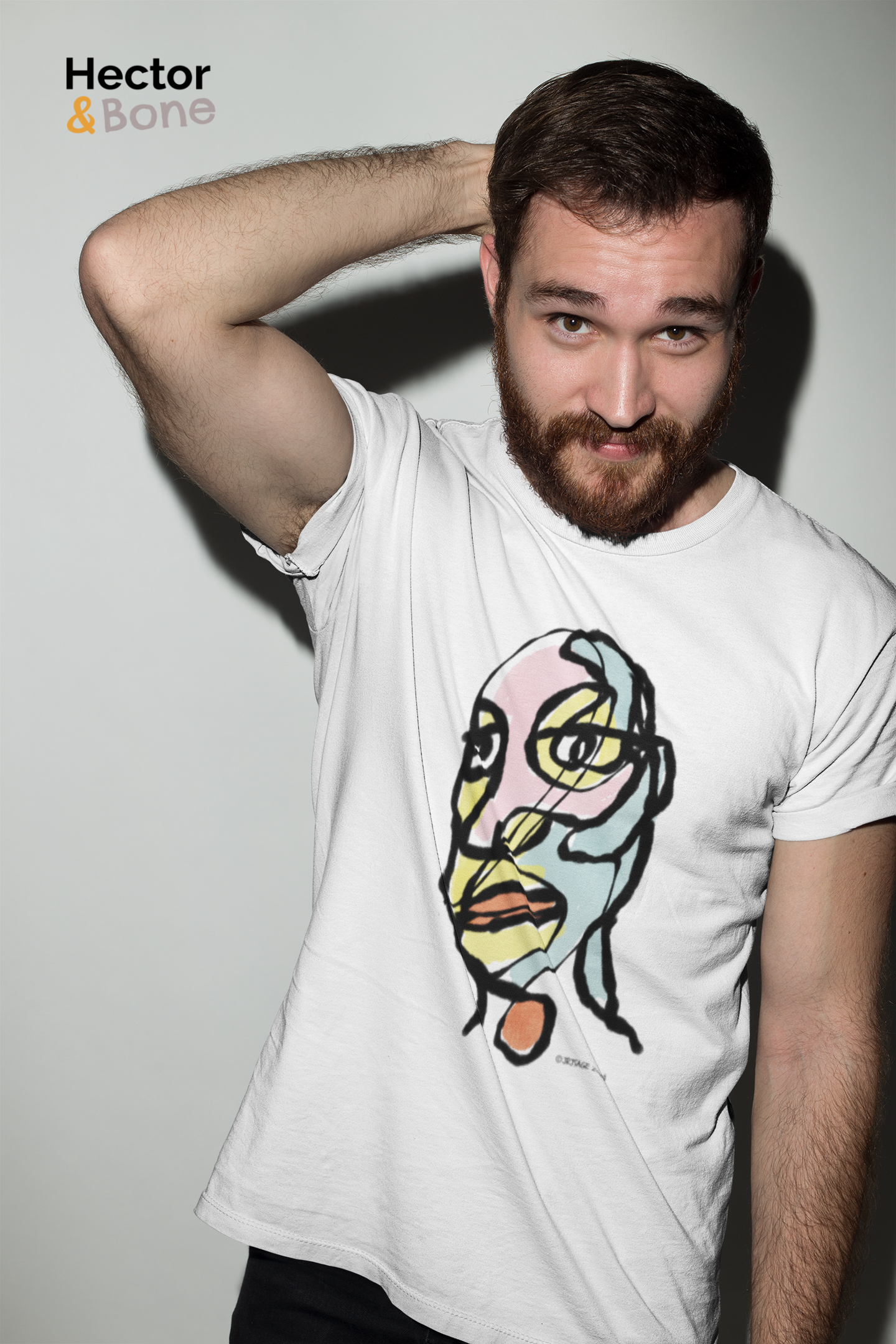 Abstract man portrait t-shirt - Young man wearing an Edgy Eddie abstract man's face illustrated on a vegan white cotton t-shirt by Hector and Bone