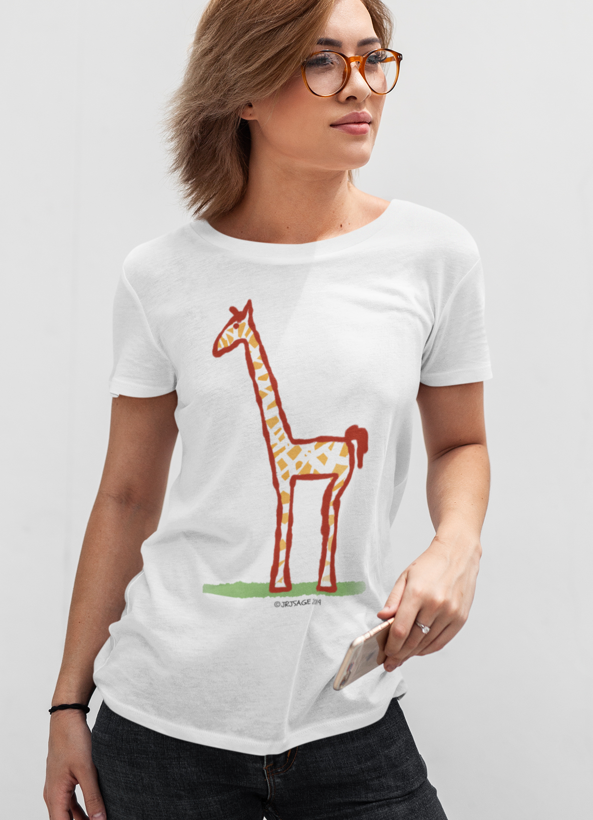 Young woman wearing a Giraffe t-shirt - Illustrated Jeffrey Giraffe vegan cotton t-shirts by Hector and Bone