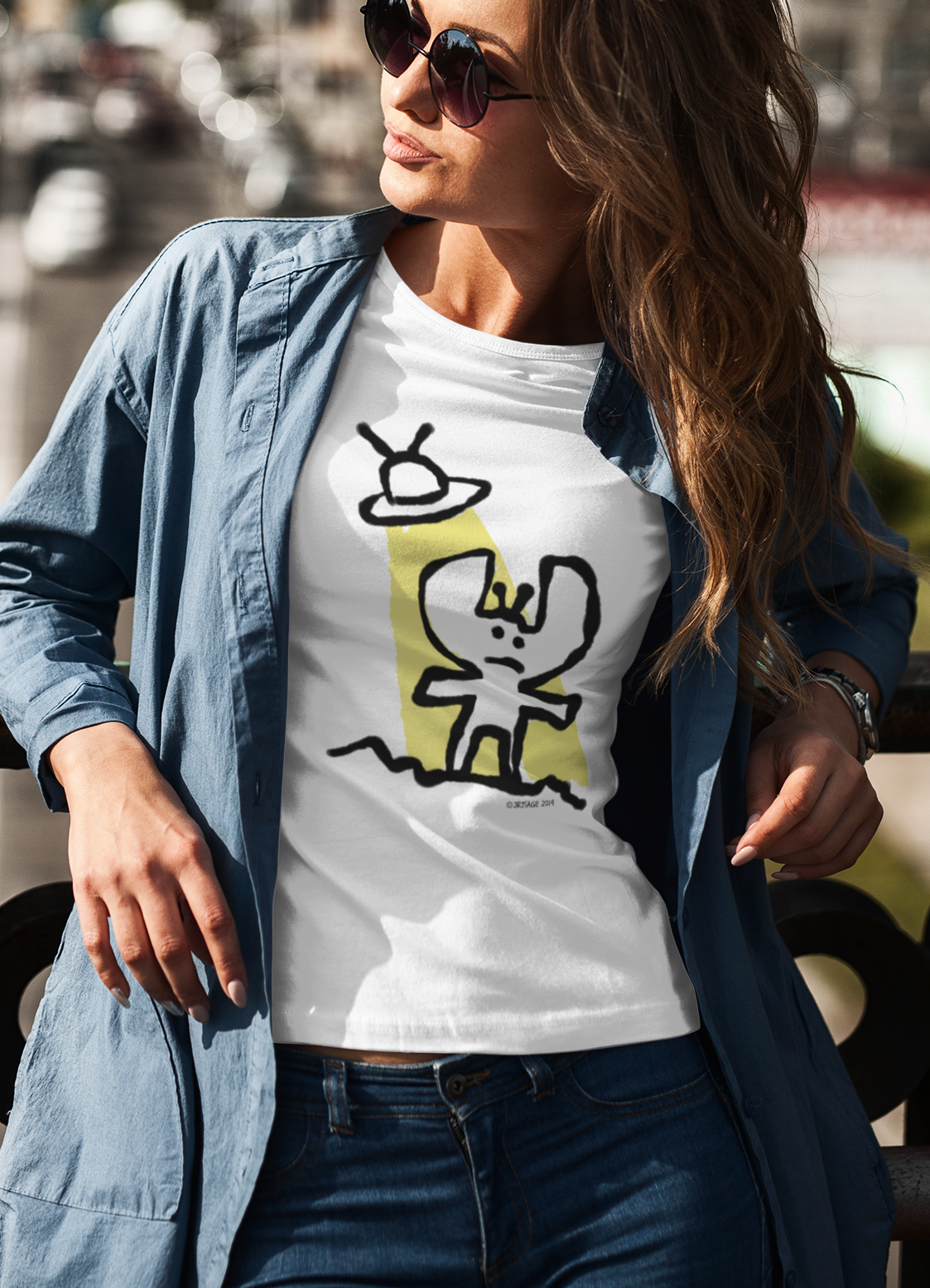 Alien T-shirt - Young woman casually wearing a cute Alien t-shirt illustrated on a classic white vegan quality t-shirt by Hector and Bone