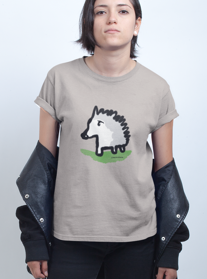 Baby Hedgehog T-shirt - Young woman wearing a cute illustrated hedgehog t-shirt in desert dust colour vegan cotton by Hector and Bone