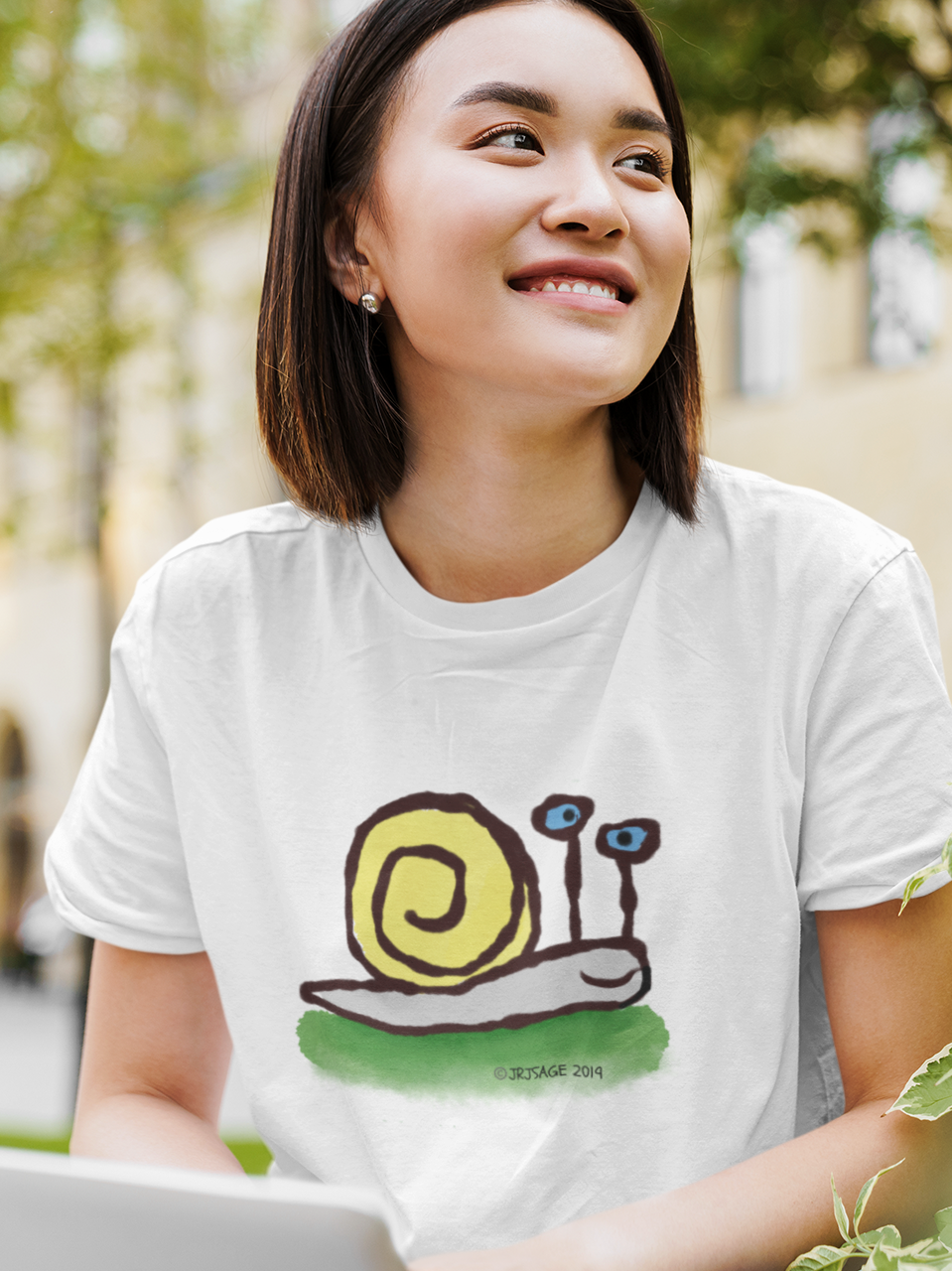 Snail T-shirt - A young woman wearing a Unisex Hector and Bone vegan cotton T-shirt with printed cute Snail illustration